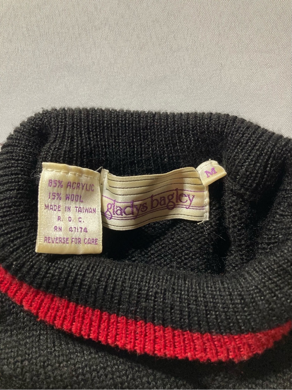 Sleeveless Black Knit Turtleneck Sweater Vest with Red Trim - Picture 4 of 4